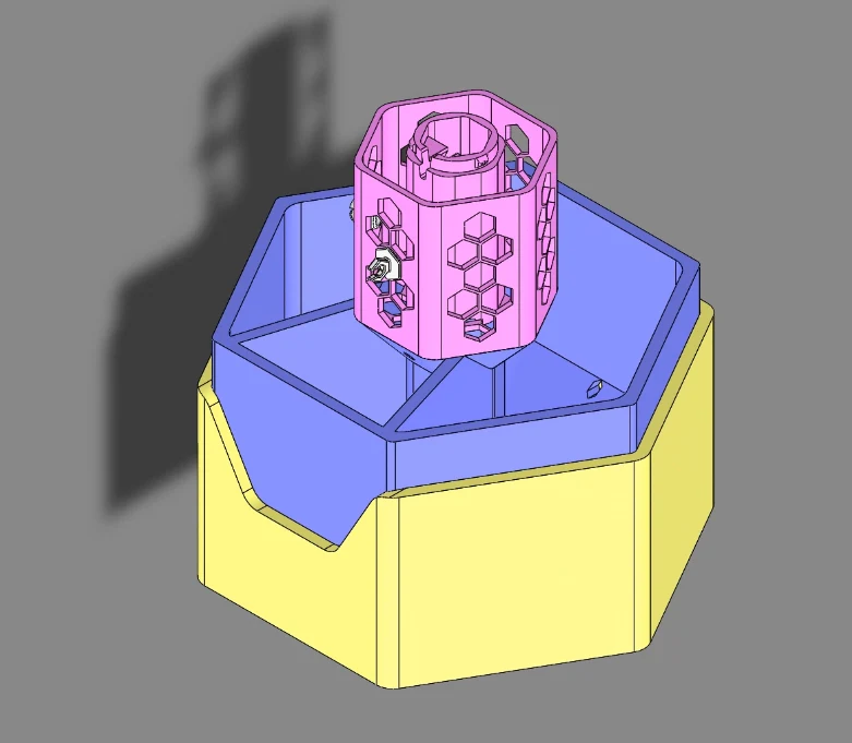 CAD assembly showing the outer reservoir, divided inner planter, and central tower
